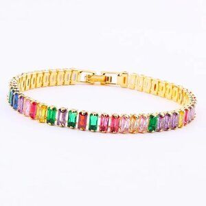 MULTICOLOR CZ TENNIS BRACELET DIPPED IN18K GOLD HAS A BUCKLE BACK CLOSURE